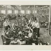 A group of Joseph & Feiss Co. factory employees working
