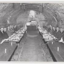 Unidentified group of men seated around tables in Leisy Brewing Company rathskaller