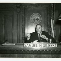 Andrew Kraffert sitting on judge bench of Samuel H. Silbert