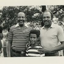 Louis and Carl Stokes with a boy
