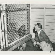Frederick C. Crawford with monkey at the Cleveland Zoo